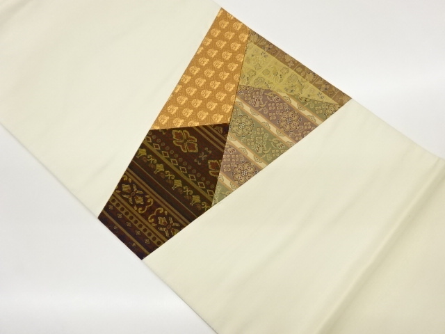 切り嵌め花鳥・縞に変わり角倉文模様織出し袋帯